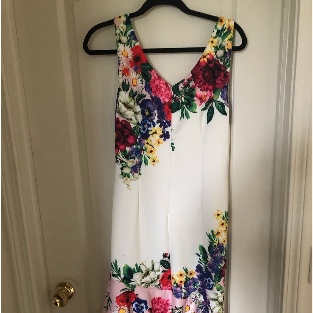 White dress with red floral design